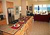 Gorgeous kitchen and bar area, opens to living room