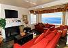 Living room with ocean views, and 2 fireplaces, flat screen tv