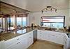 Beautiful kitchen with granite counters, overlooks ocean