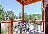 View of the property, Longs Peak and granite boulders from the entry deck.