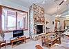 the living area offers increadible views of the Lumpy Ridge and a gas fireplace.