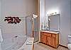 The Master Bath is complete with a two person, jetted tub, step in shower and extra room.