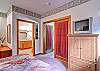 The master bedroom offers a king sized bed.