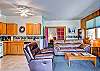 Enjoy relaxing in your living area with views of our pond and snow capped peaks in the distance.