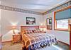 The Master bedroom in D1 has a king-sized bed.