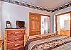 The Master Bedroom has a king-sized bed.