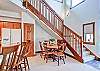 Another view of the dining area and staircase