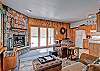 Here is another view of the living area, kitchen and entry.
