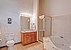 The bathroom is complete with a two-person jetted tub, separate shower and plenty of space.