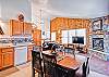 Another view of the kitchen, dining and living areas.
