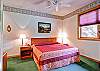 This master bedroom has a king-sized bed.