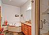 Master Bath has a two-person jetted tub, separate shower and plenty of room.