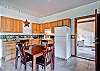 Here is the kitchen for C2/3, with the door to the second bedroom to the right.