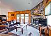 This is a top floor condo.  The living area has a private balcony that overlooks our stream-fed pond and has views to Longs Peak.