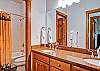 The second full bathroom has double sinks separate from the bath and toilet to accomodate all guests.