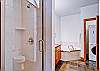 The master bathroom offers a jetted bathtub, separate shower and a stackable washer/dryer for your convenience.