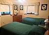 Lower Level Bed Room with 2 Twin Beds, TV and Ceiling Fan