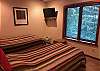 Lower Level Bed Room with 2 Twin Beds. TV and Ceiling Fan