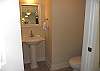 The half bath is located right around the corner from the bunk area.