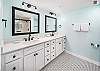 His and hers sinks and large vanity space for your convenience. 