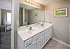 Double sinks are featured in the master bathroom to help everyone get ready.