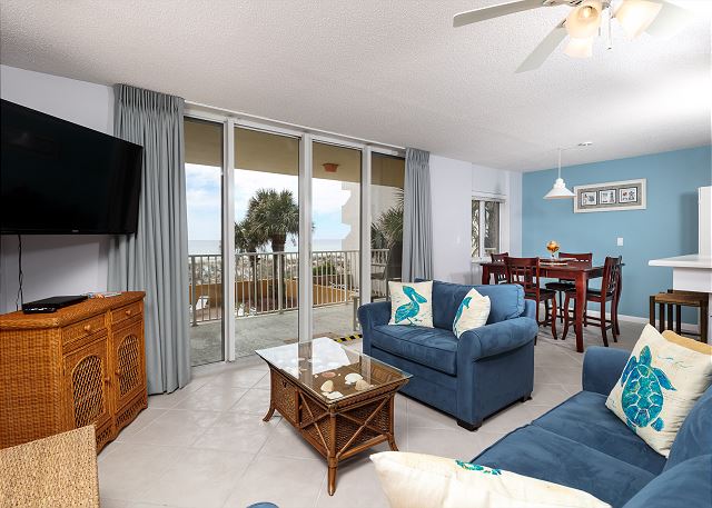Great setup and lots of comfy seating in this 2 bedroom beach front condo! Sit back, relax and enjoy the gorgeous views!
