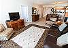 Flat screen TVs and DVD players can be found through-out the condo.