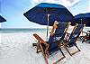 See those beach chairs and umbrellas? One set comes with the rental DAILY during season. Compliments of Brooks and Shorey Resorts!