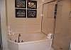 Another walk-in shower and garden tub can be found in the guest bath as well.