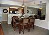 Conveniently located dining area with plenty of seating and very comfortable chairs.