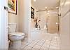 Another walk-in shower and garden tub can be found in the guest bath as well.