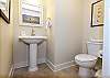 The half bath is located right around the corner from the bunk area.