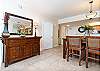 The dining area has plenty of seating for you and your guests to enjoy meals around the table.