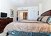 Another flat screen TV and DVD player are located in the master bedroom