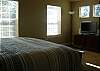 A king size bed welcomes you to sleep away any weekend play or shopping you've done.