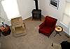 Open and bright. Use the electric woodstove for added atmosphere!