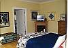 Snuggle into bed, watch your flatscreen while the fireplace warms your room with a warm glow.