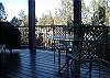 A tree house patio and hot tub.