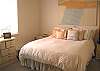 Cushy comfort. Note the painting above you created just for this room. Southern exposure welcomes our constant sunshine.
