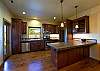 ADA standards in every aspect of design in this wonderful home. A lower positioned microwave and garbage disposal create easy wheelchair access.