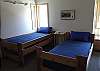 One of two bunk rooms. This one has the sleeping loft that can add more sleeping space wiht a tiwn and two sleeping pads. Biing your sleeping bags to use with the pads.
