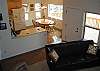 Open vaulted ceilings make this a spacious
living room.