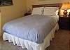 The master bedroom queen bed. . .yawn!