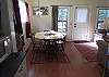 Additional dining chairs in each bedroom.