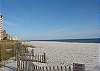Beach area in front of White Caps to east.