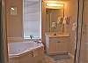 Bath off bedroom 1.  Has separte shower.
