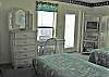 Bedroom 2 - additional view.  Access to balcony.