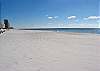 Beach area in front of Caribbean to east.