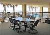 Covered area beside pool.