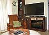 Additional view of living room area.  Cozy electric fireplace in tv stand.